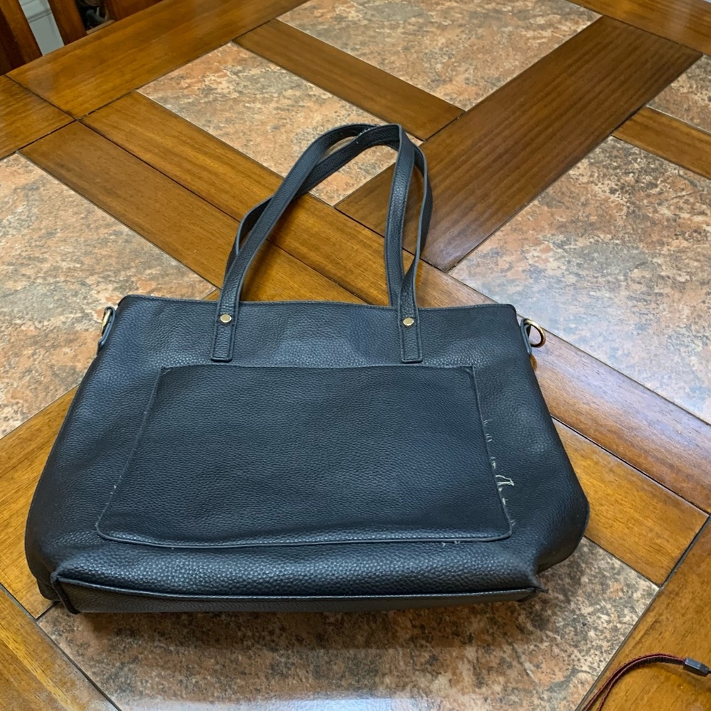 Black tote bag with long shoulder straps